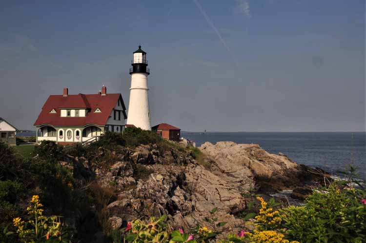 Portland Head Light is the iconic lighthouse of Cape Elizabeth. It sits on the dramatic shores of Fort Williams Park. It was first lit in January of 1790. A plaque on the grounds of the light reads that Henry Wadsworth Longfellow often visited this lighthouse and that it was the inspiration for his poem "The Lighthouse."